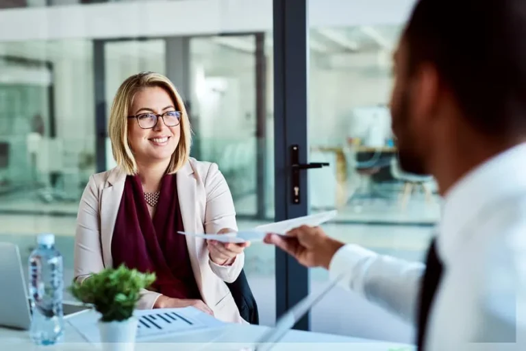 people sitting down at a hiring interview